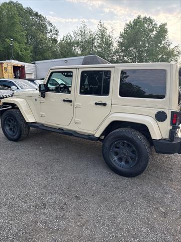 used 2012 Jeep Wrangler Unlimited car, priced at $12,998