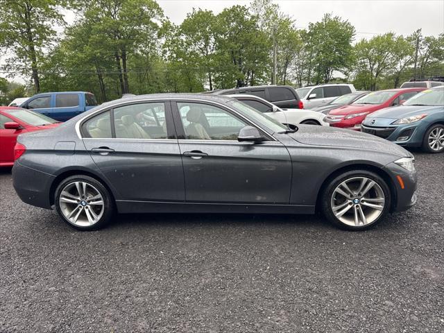 used 2017 BMW 330 car, priced at $12,378