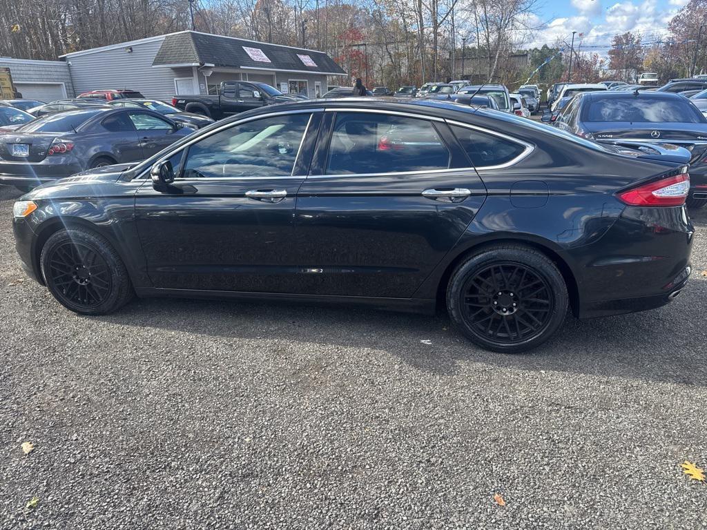 used 2015 Ford Fusion car, priced at $6,799