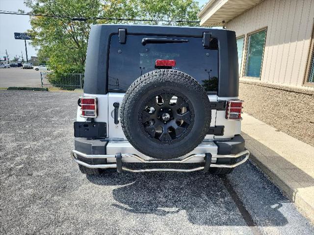 used 2010 Jeep Wrangler Unlimited car, priced at $11,890