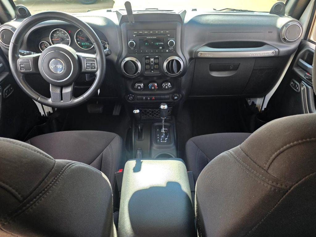 used 2014 Jeep Wrangler Unlimited car, priced at $16,980