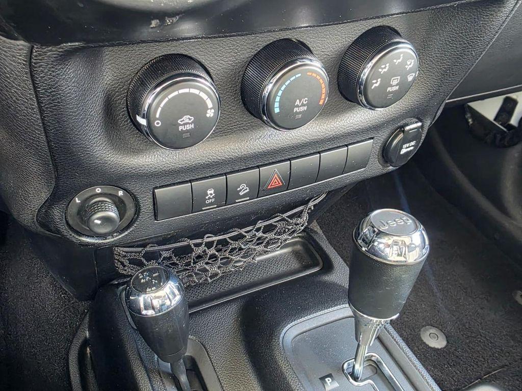 used 2014 Jeep Wrangler Unlimited car, priced at $16,980