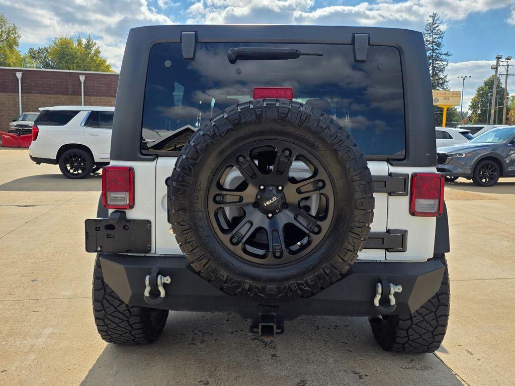 used 2014 Jeep Wrangler Unlimited car, priced at $16,980