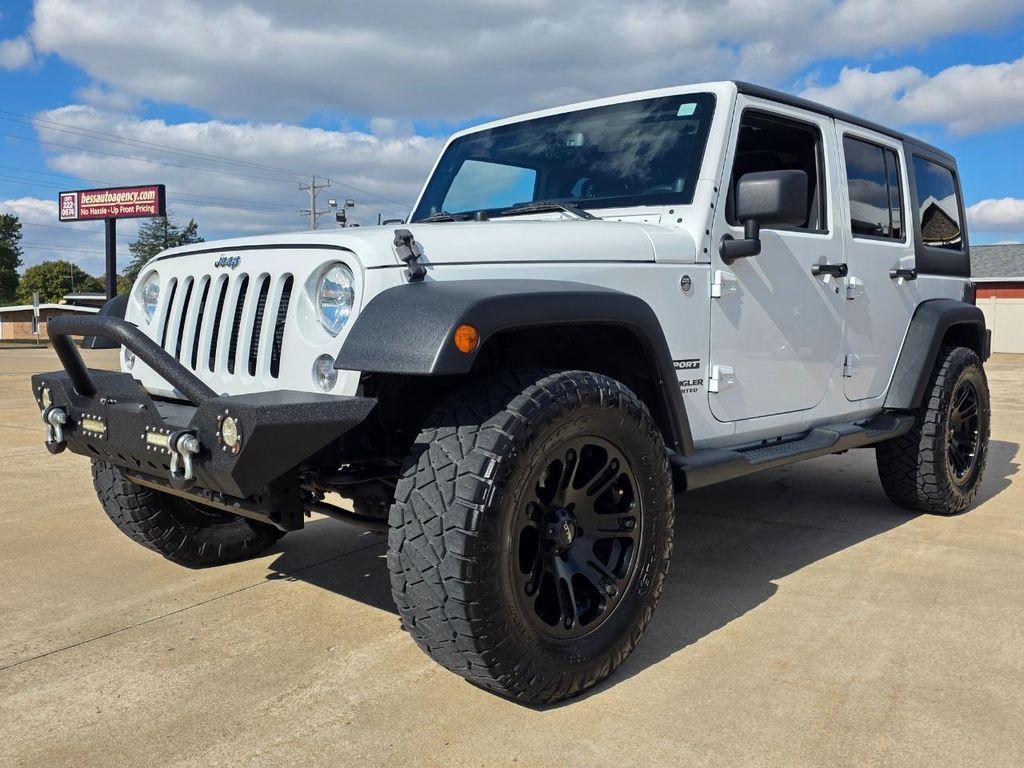 used 2014 Jeep Wrangler Unlimited car, priced at $16,980