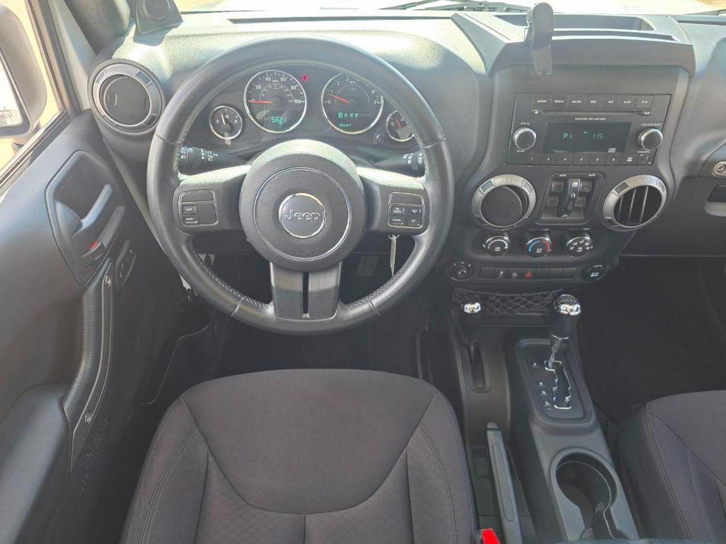 used 2014 Jeep Wrangler Unlimited car, priced at $16,980