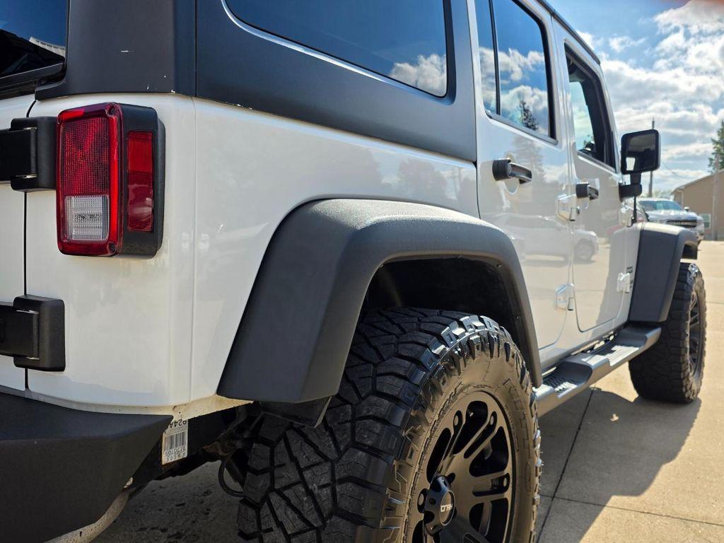 used 2014 Jeep Wrangler Unlimited car, priced at $16,980