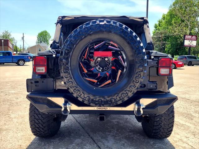 used 2010 Jeep Wrangler Unlimited car, priced at $13,980