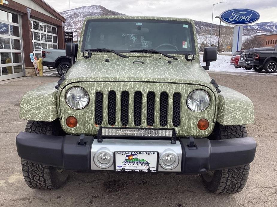 used 2010 Jeep Wrangler Unlimited car, priced at $16,489