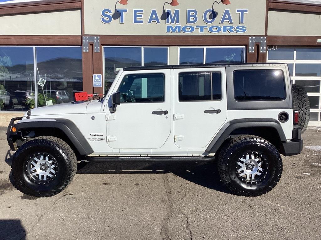 used 2018 Jeep Wrangler JK Unlimited car, priced at $24,489