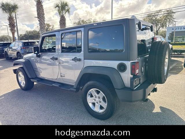 used 2014 Jeep Wrangler Unlimited car, priced at $13,198