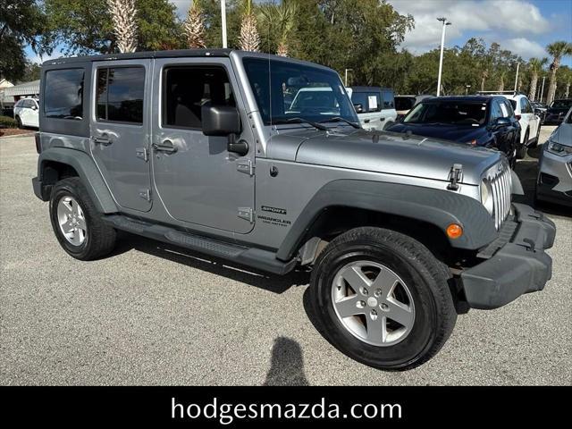 used 2014 Jeep Wrangler Unlimited car, priced at $13,198