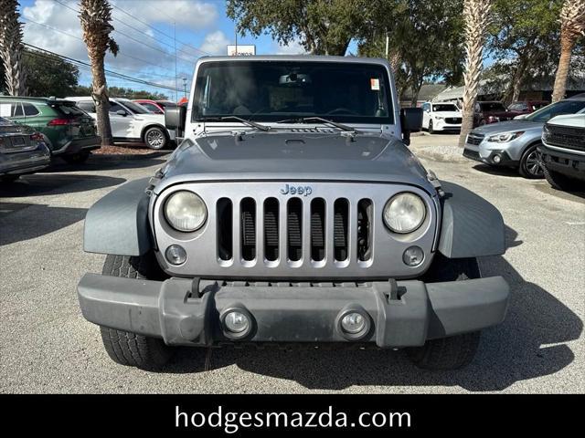 used 2014 Jeep Wrangler Unlimited car, priced at $13,198