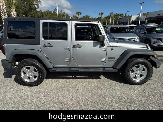 used 2014 Jeep Wrangler Unlimited car, priced at $13,198