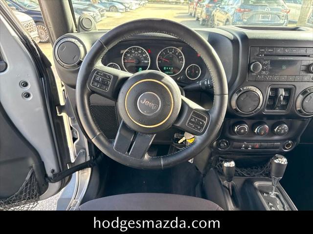 used 2014 Jeep Wrangler Unlimited car, priced at $13,198