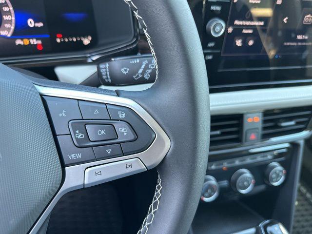 new 2025 Volkswagen Taos car, priced at $27,194