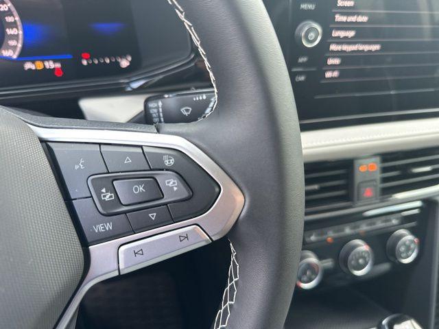 new 2025 Volkswagen Taos car, priced at $28,238