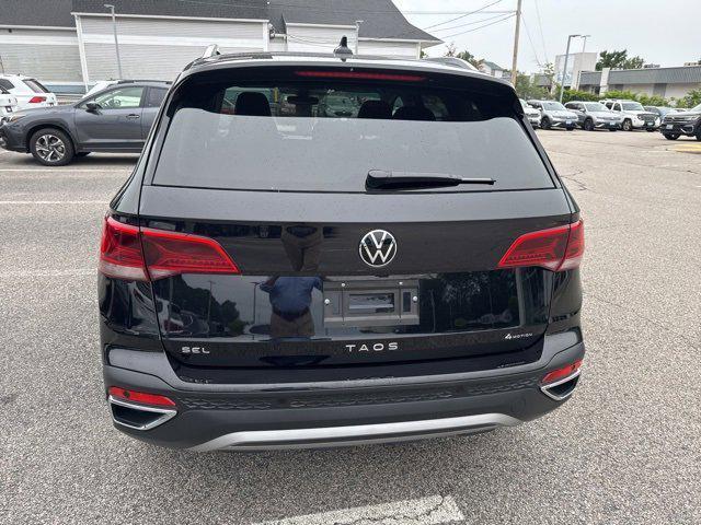 used 2024 Volkswagen Taos car, priced at $30,500