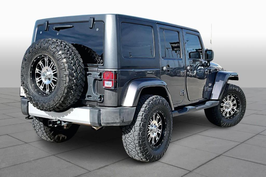 used 2014 Jeep Wrangler Unlimited car, priced at $15,695