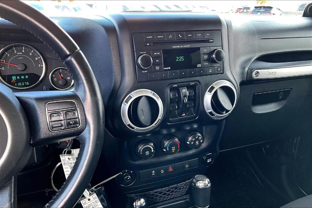 used 2014 Jeep Wrangler Unlimited car, priced at $15,695