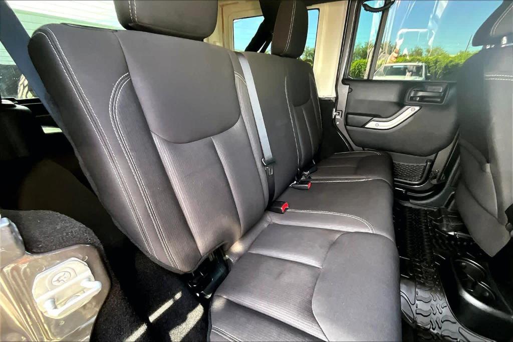 used 2014 Jeep Wrangler Unlimited car, priced at $15,695