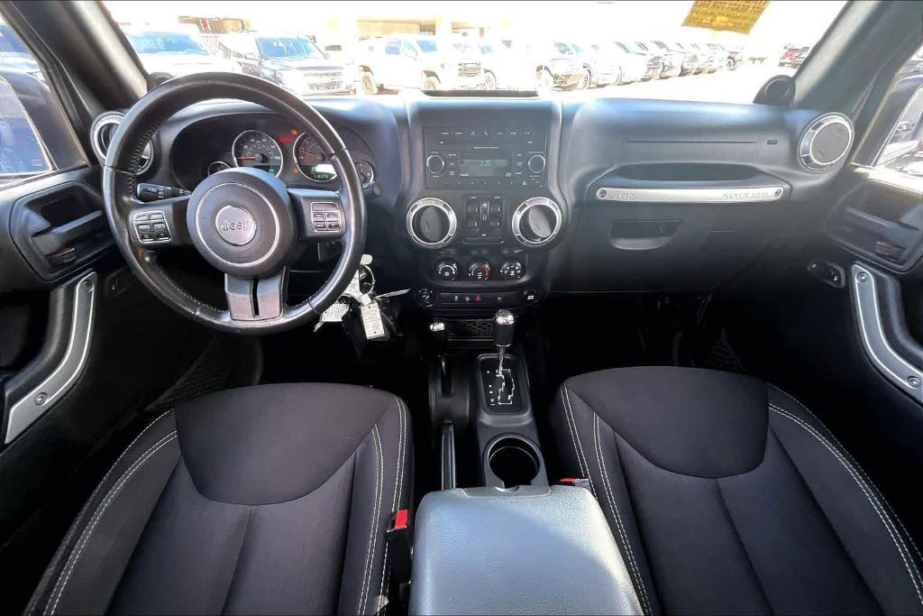 used 2014 Jeep Wrangler Unlimited car, priced at $15,695