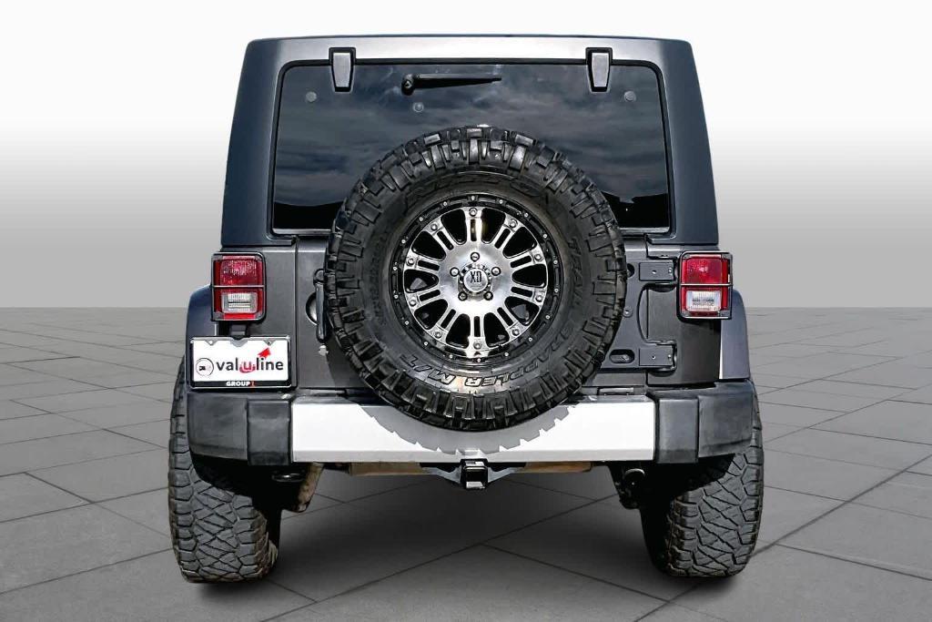 used 2014 Jeep Wrangler Unlimited car, priced at $15,695