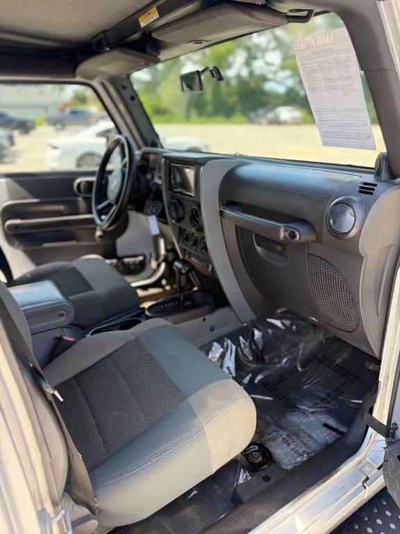 used 2010 Jeep Wrangler Unlimited car, priced at $8,999