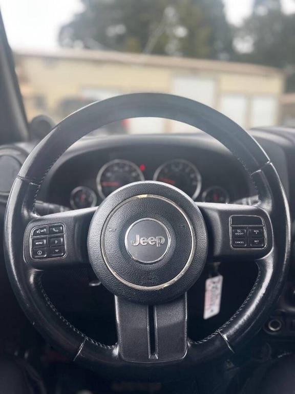 used 2012 Jeep Wrangler Unlimited car, priced at $12,999