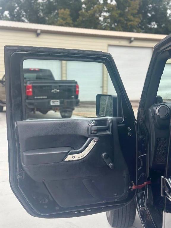 used 2012 Jeep Wrangler Unlimited car, priced at $12,999
