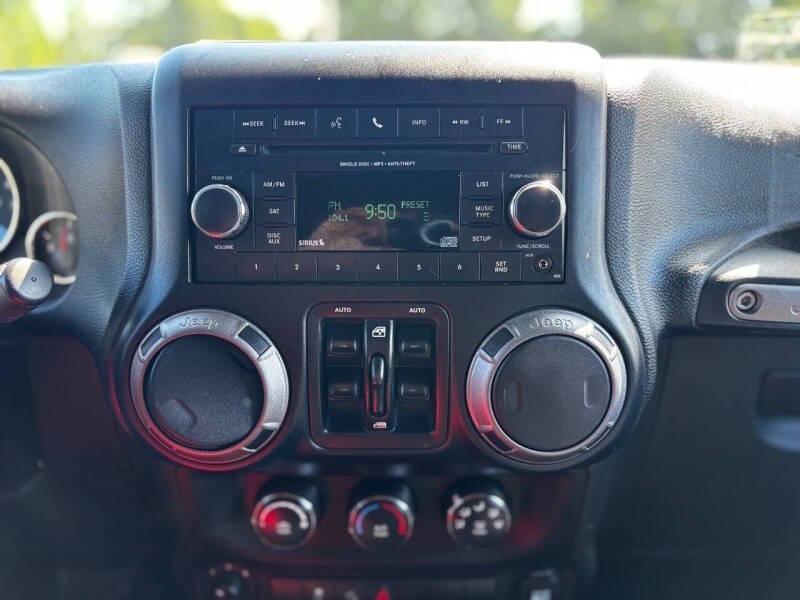 used 2015 Jeep Wrangler Unlimited car, priced at $10,999