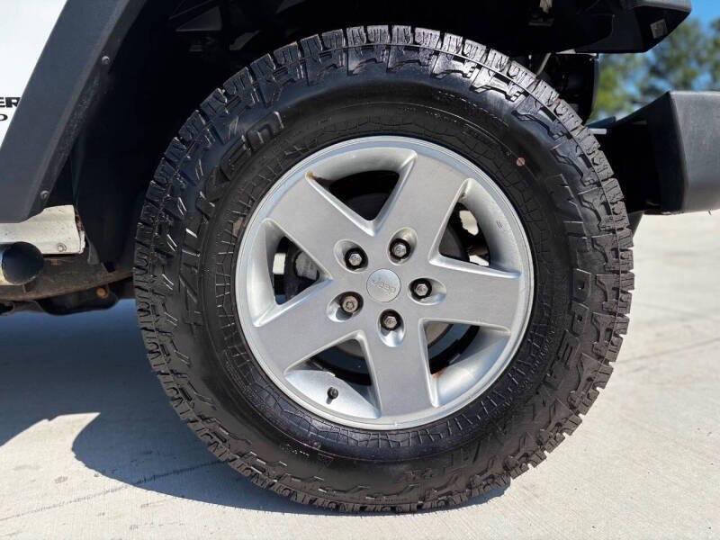 used 2015 Jeep Wrangler Unlimited car, priced at $10,999