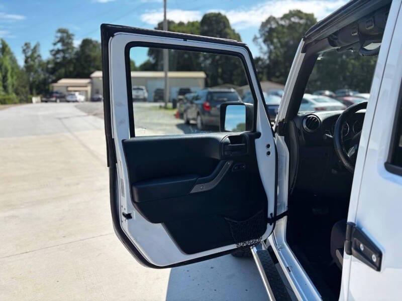 used 2015 Jeep Wrangler Unlimited car, priced at $10,999