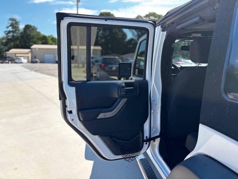 used 2015 Jeep Wrangler Unlimited car, priced at $10,999