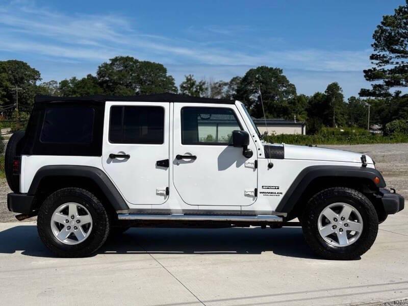 used 2015 Jeep Wrangler Unlimited car, priced at $10,999