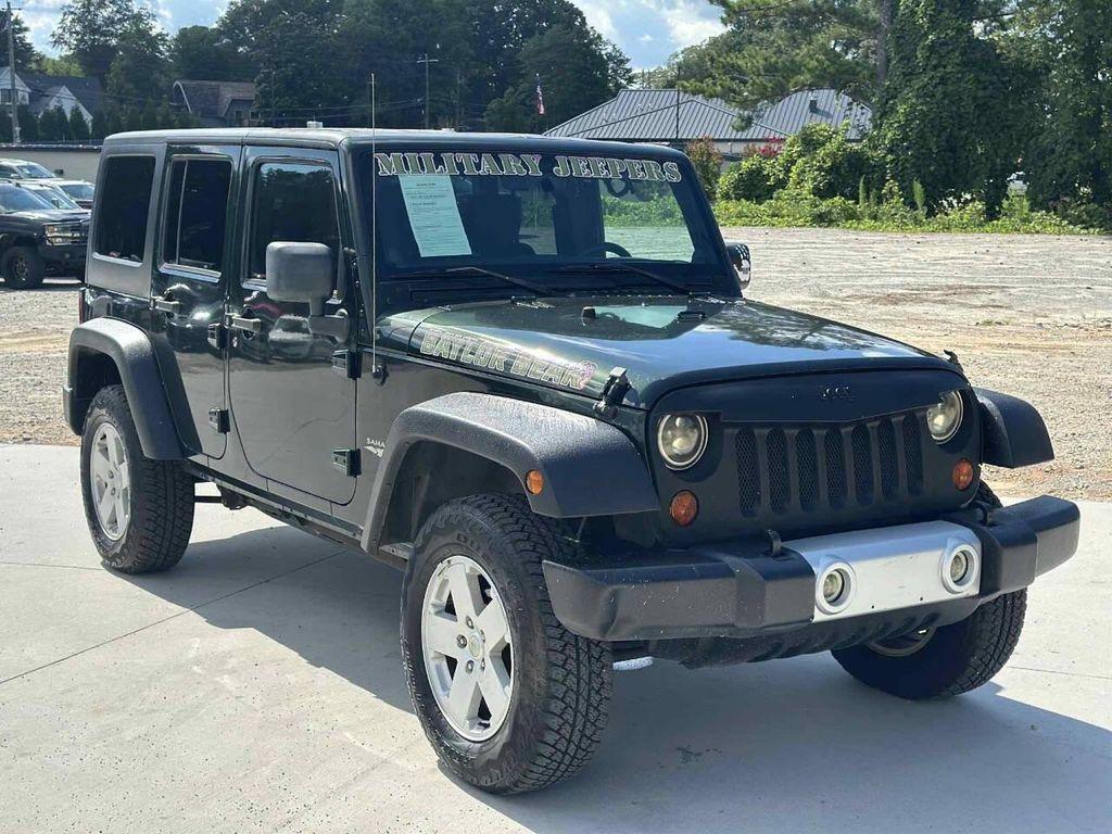 used 2011 Jeep Wrangler Unlimited car, priced at $11,999