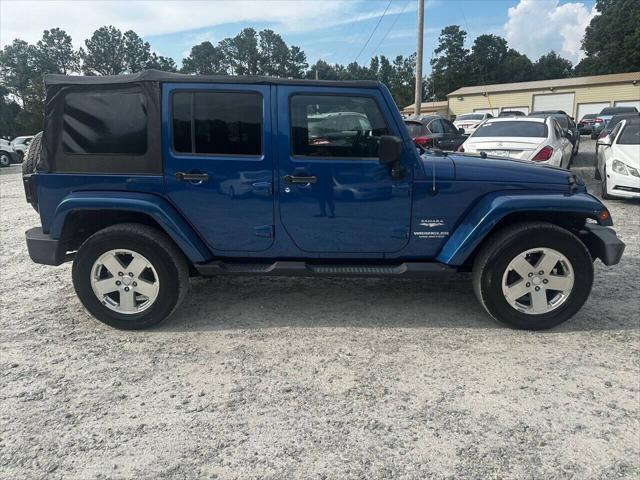 used 2009 Jeep Wrangler Unlimited car, priced at $10,999