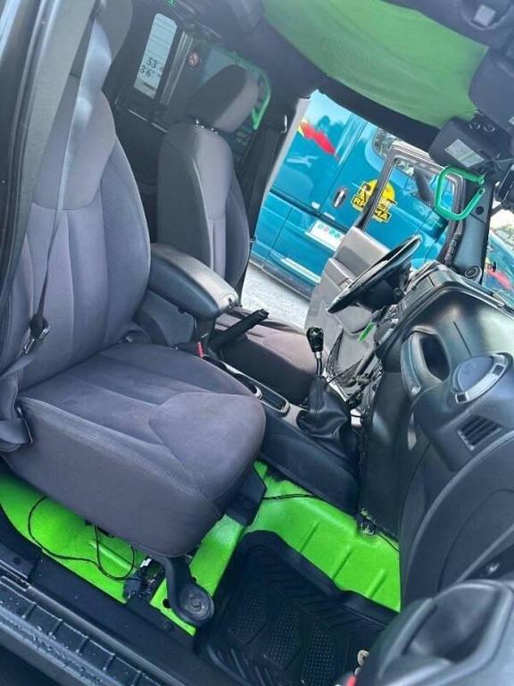 used 2014 Jeep Wrangler Unlimited car, priced at $10,900