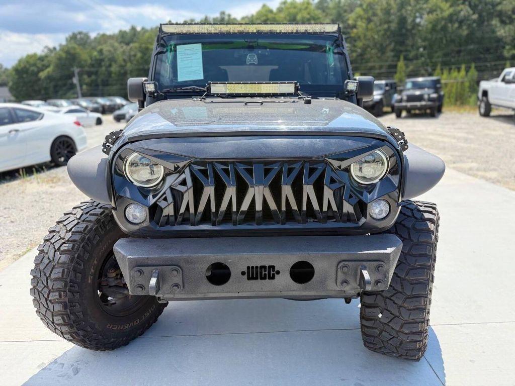 used 2014 Jeep Wrangler Unlimited car, priced at $10,900