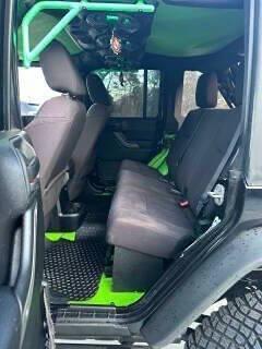 used 2014 Jeep Wrangler Unlimited car, priced at $10,900