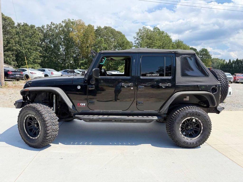 used 2014 Jeep Wrangler Unlimited car, priced at $10,900