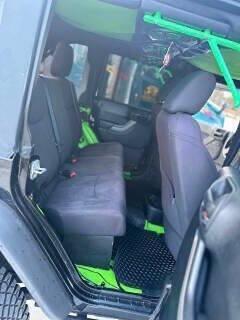 used 2014 Jeep Wrangler Unlimited car, priced at $10,900