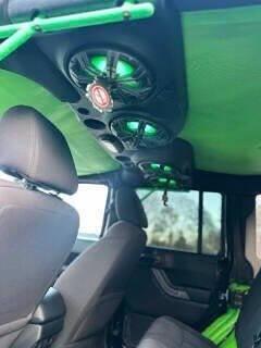 used 2014 Jeep Wrangler Unlimited car, priced at $10,900