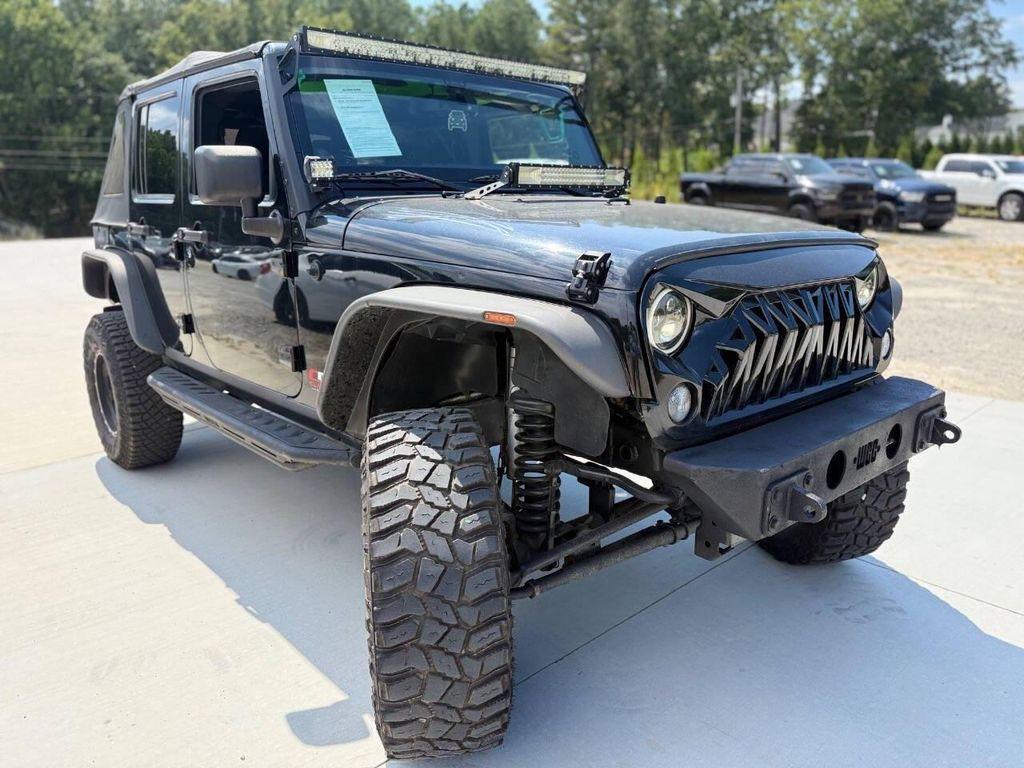 used 2014 Jeep Wrangler Unlimited car, priced at $10,900