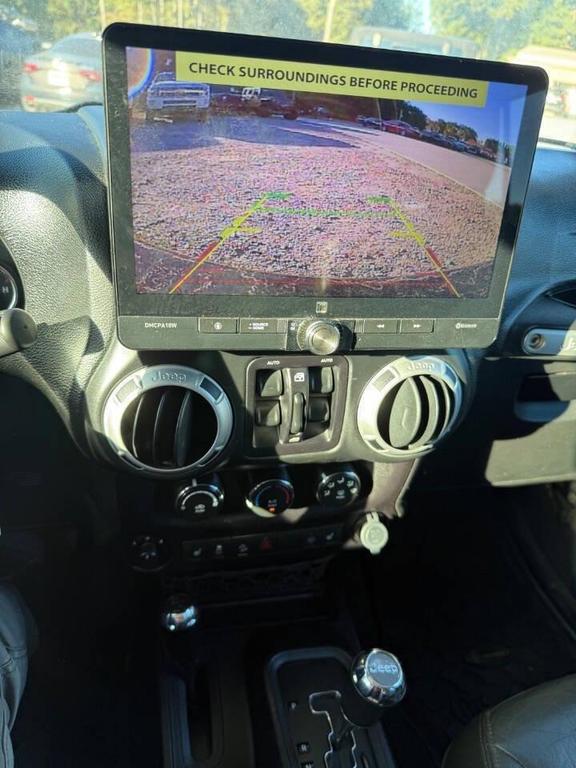 used 2016 Jeep Wrangler Unlimited car, priced at $17,999