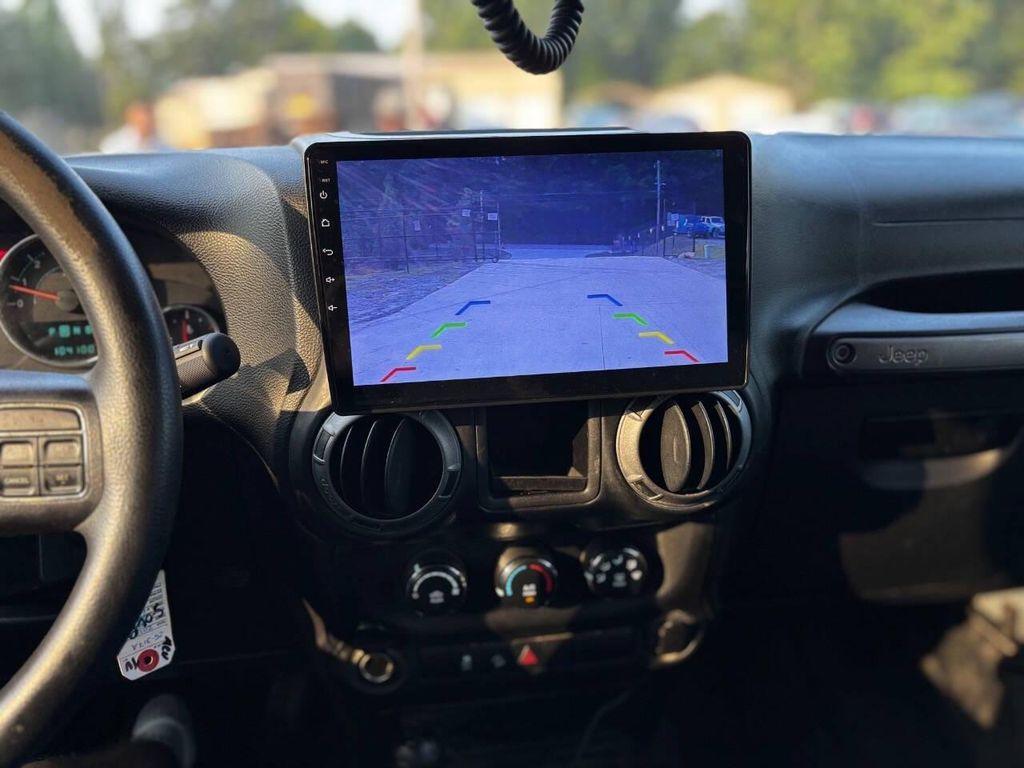 used 2014 Jeep Wrangler Unlimited car, priced at $14,999
