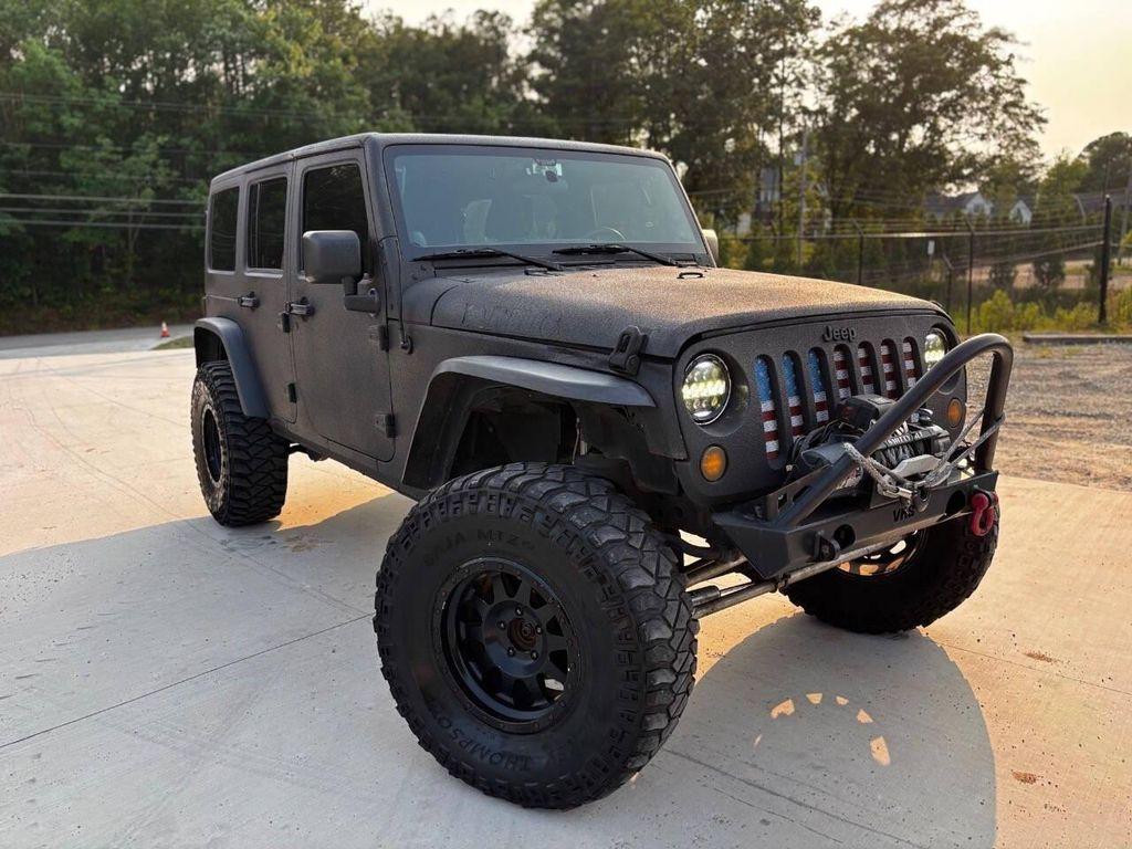 used 2014 Jeep Wrangler Unlimited car, priced at $14,999
