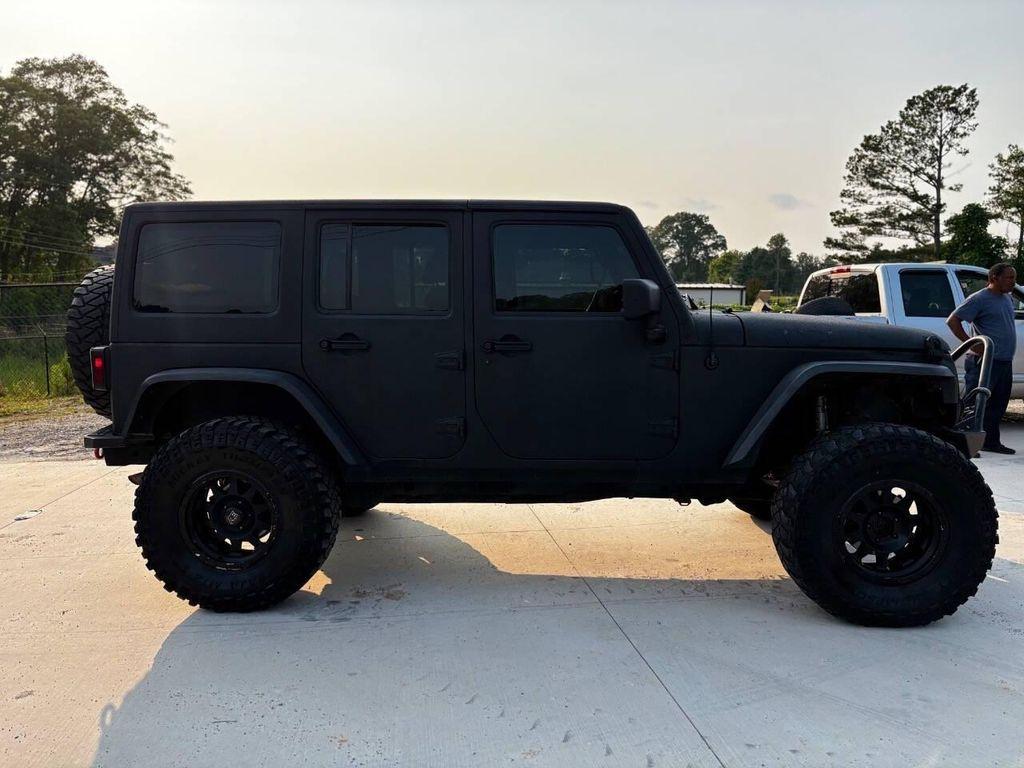 used 2014 Jeep Wrangler Unlimited car, priced at $13,500