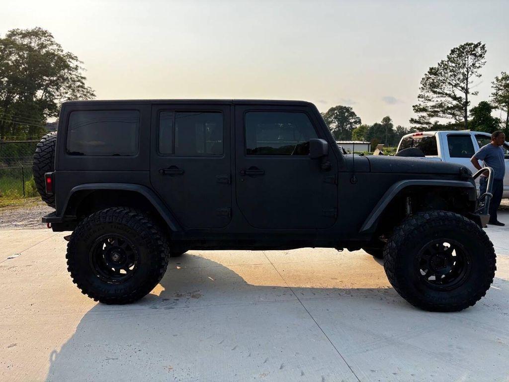 used 2014 Jeep Wrangler Unlimited car, priced at $14,999
