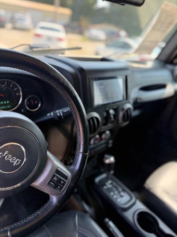 used 2016 Jeep Wrangler Unlimited car, priced at $13,500