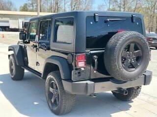 used 2016 Jeep Wrangler Unlimited car, priced at $13,999